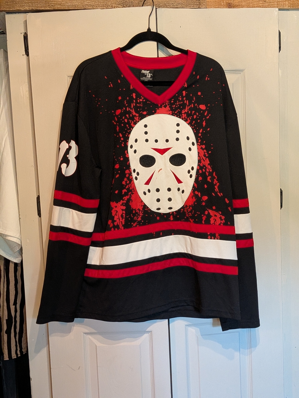 Black and Red Hockey-Style Tunic Top with Mask Graphic
